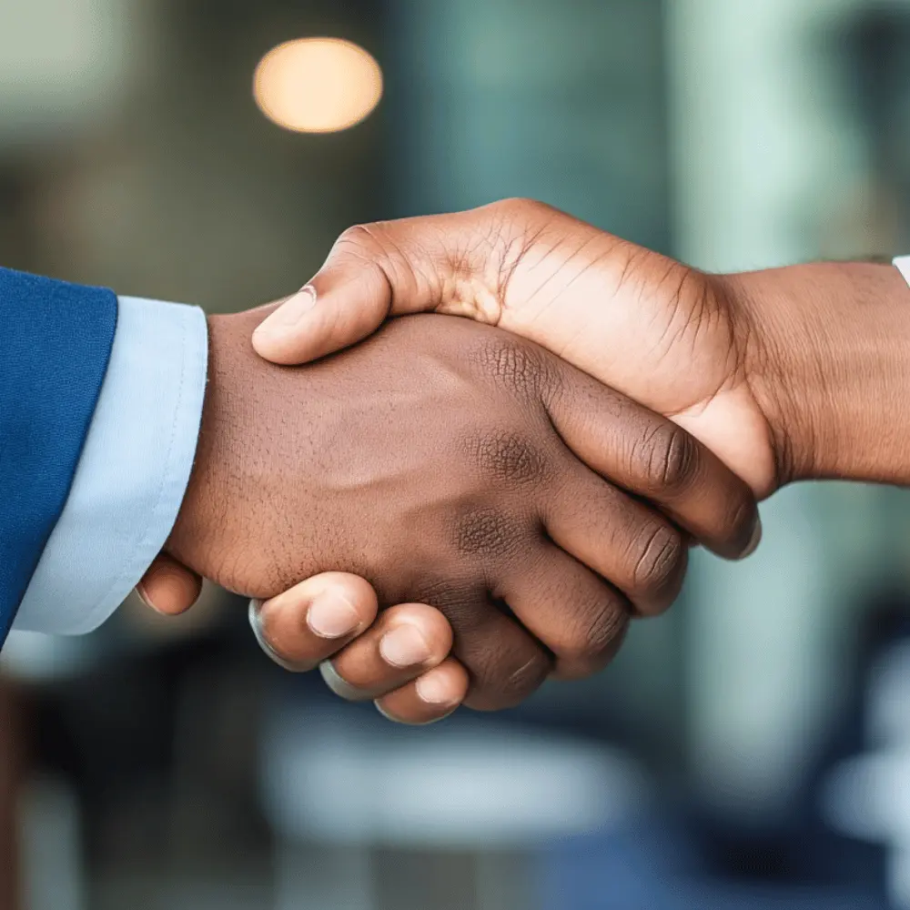 two persons shake hands
